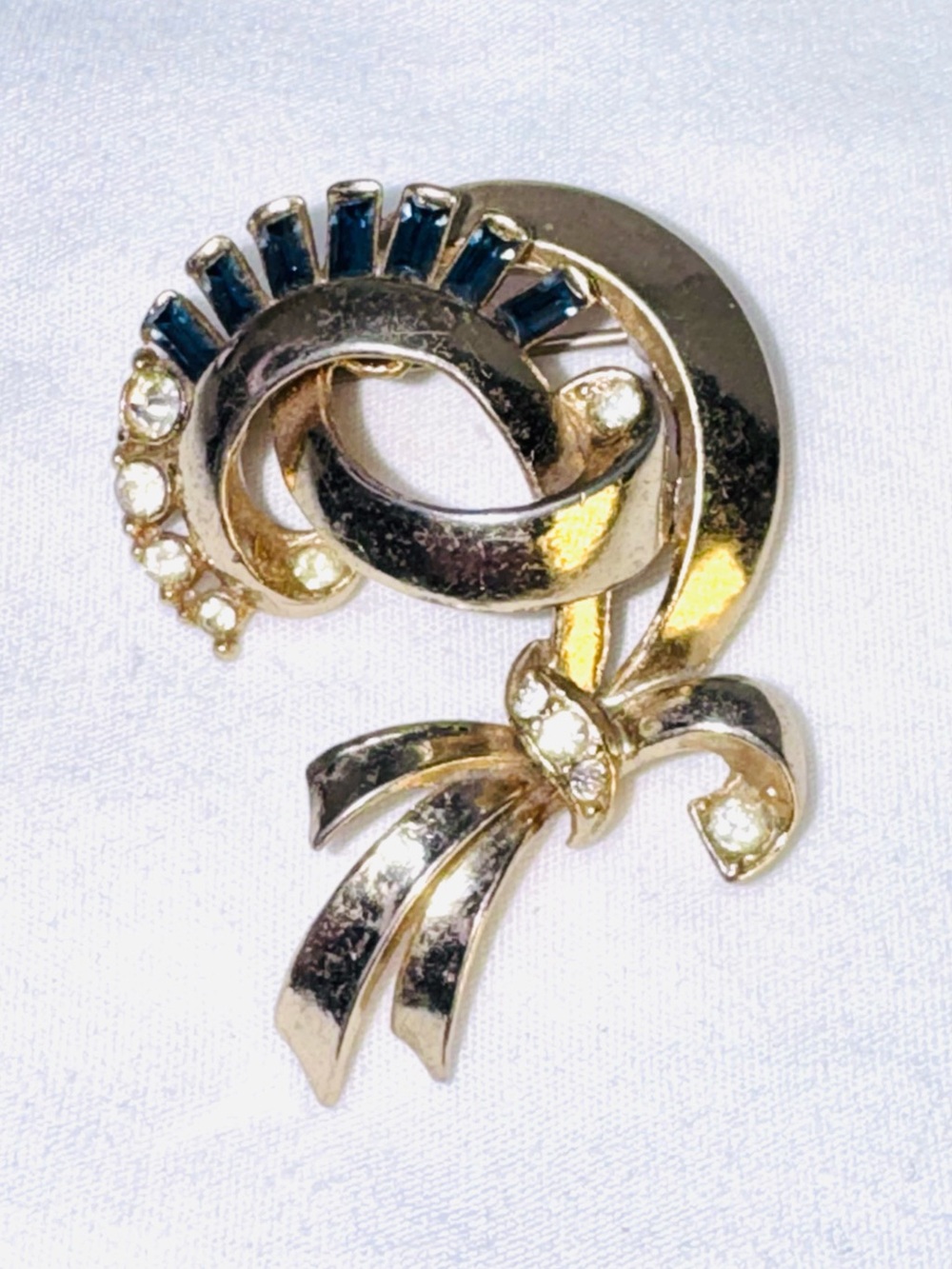 Vintage Coro Gold Ribbon Bow Brooch with Blue and Clear Stones-